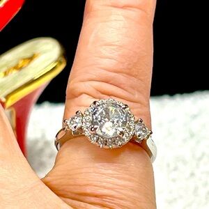 New halo ring with pretty accent stones sturdy not flimsy